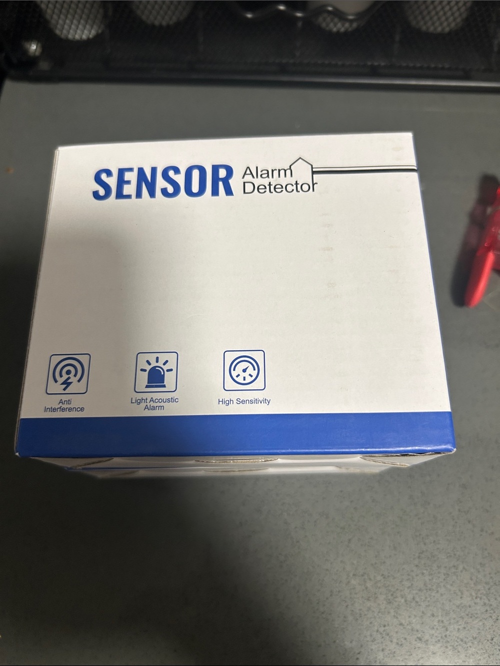 SENSOR Alarm Detector - White and Blue Box